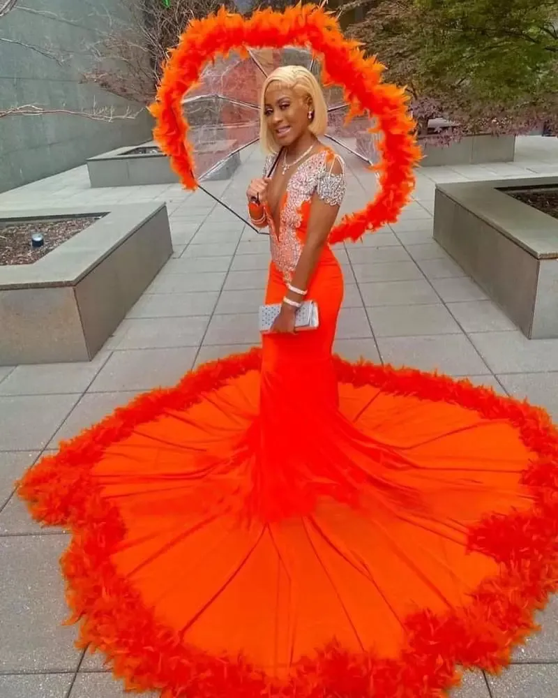 Gorgeous Orange Mermaid Tassel V-Neck Lace Prom Dress With Long Sleeves