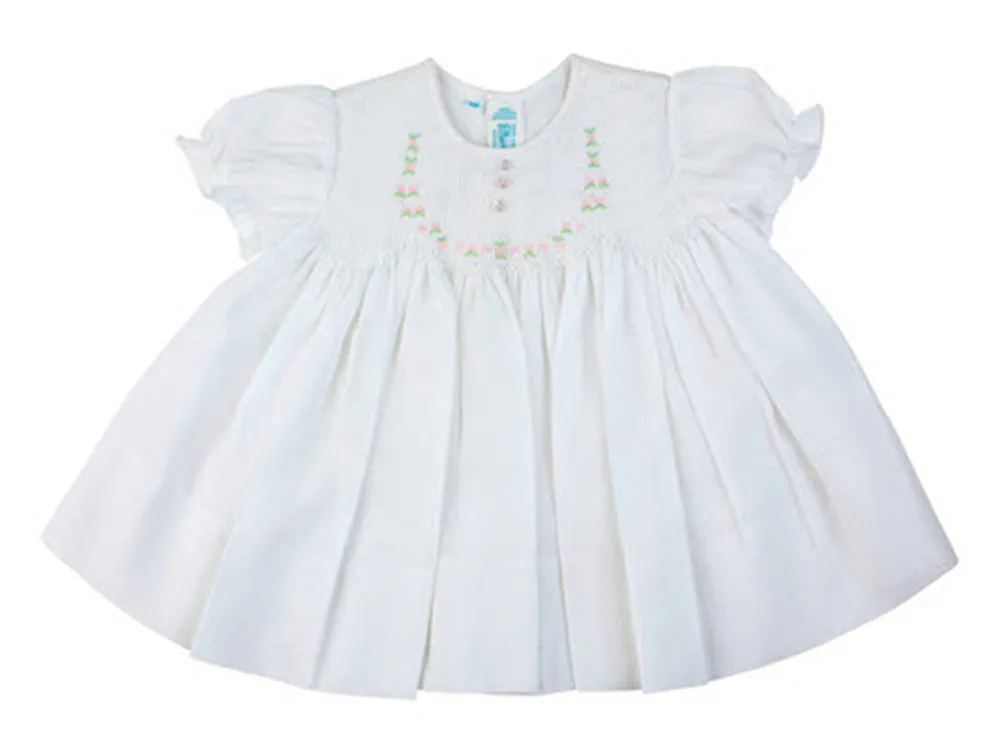 White Smocked Baby Dress with Embroidered Rosettes